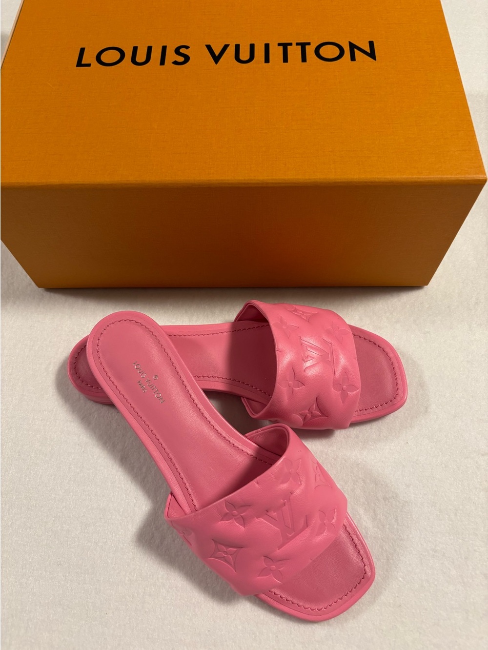 Louis Vuitton Revival Lambskin Leather Hot Pink Embossed Flat  Mule Sandals.